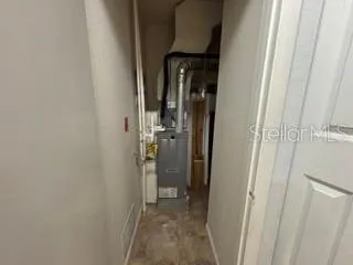 a view of a bathroom from a corridor