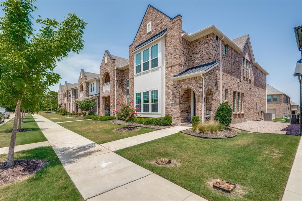 7258 Switchgrass Road Frisco, TX 75033 - Photo 1 of 1 a view of a building with a yard