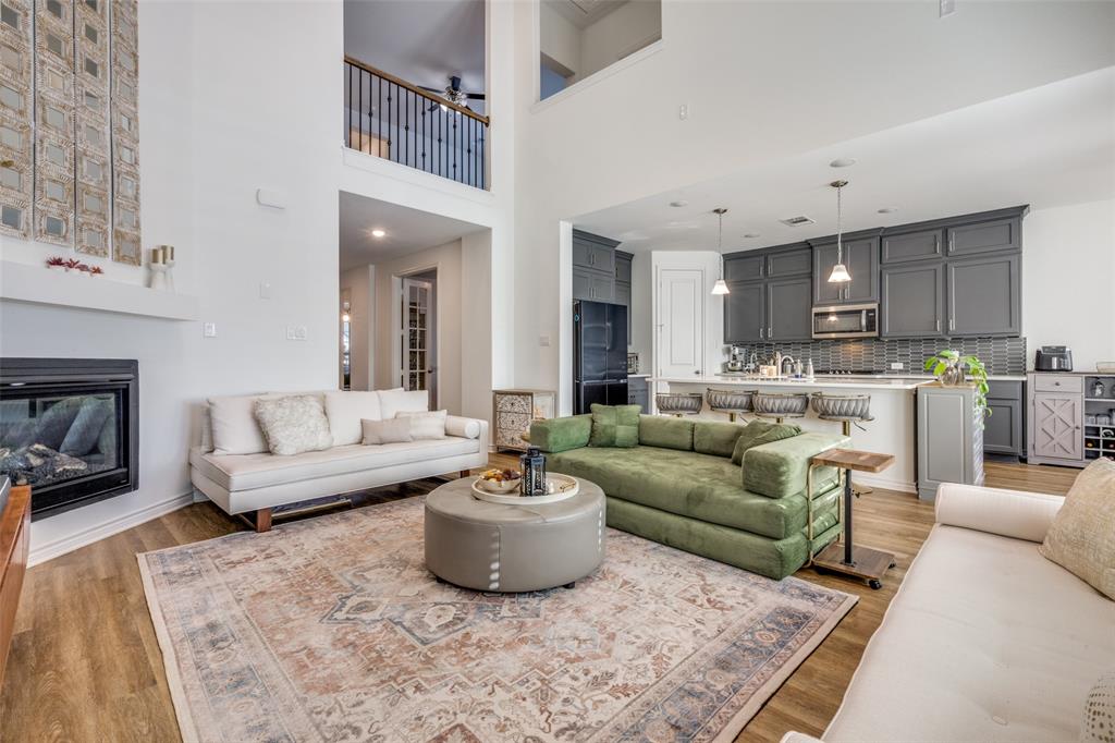 4804 Long Pond Trail Flower Mound, TX 76262 - Photo 6 of 22 a living room with furniture and a view of kitchen