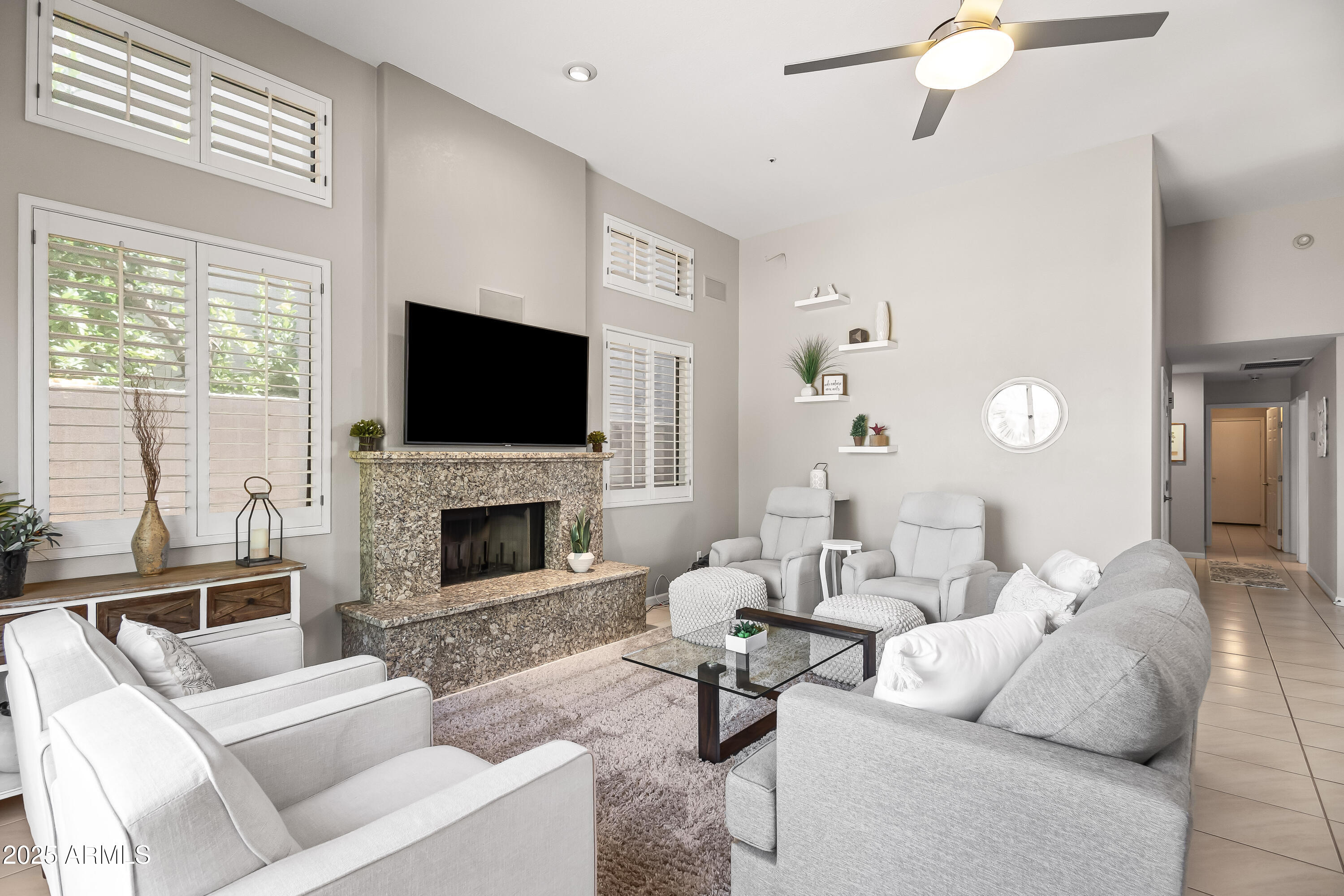 7740 East Gainey Ranch Road, Unit 23 Scottsdale, AZ 85258 - Photo 13 of 45 FAMILY RM + FIREPLACE DETAIL