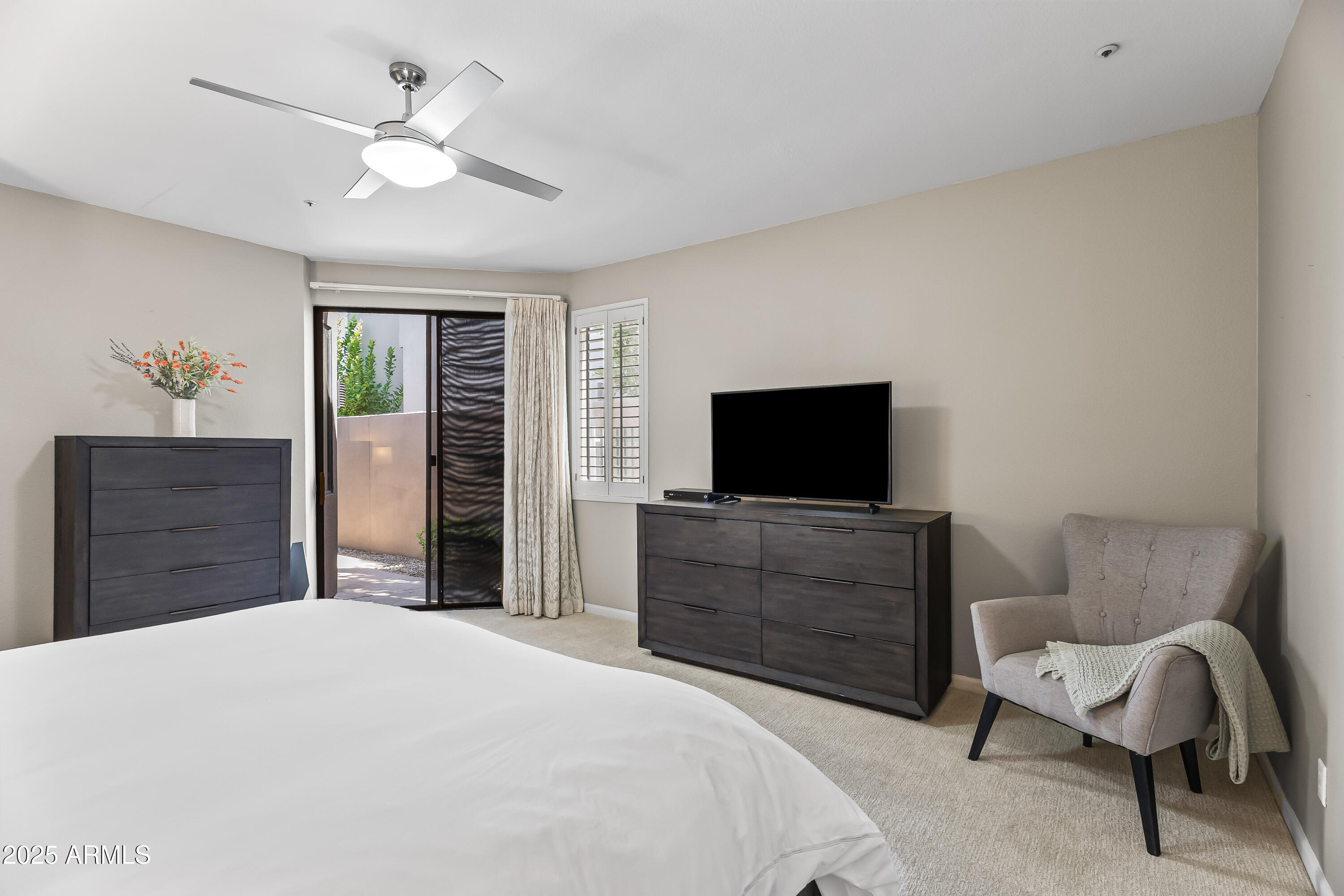 7740 East Gainey Ranch Road, Unit 23 Scottsdale, AZ 85258 - Photo 18 of 45 PRIMARY BDRM - SEP. EXIT TO BACKYARD