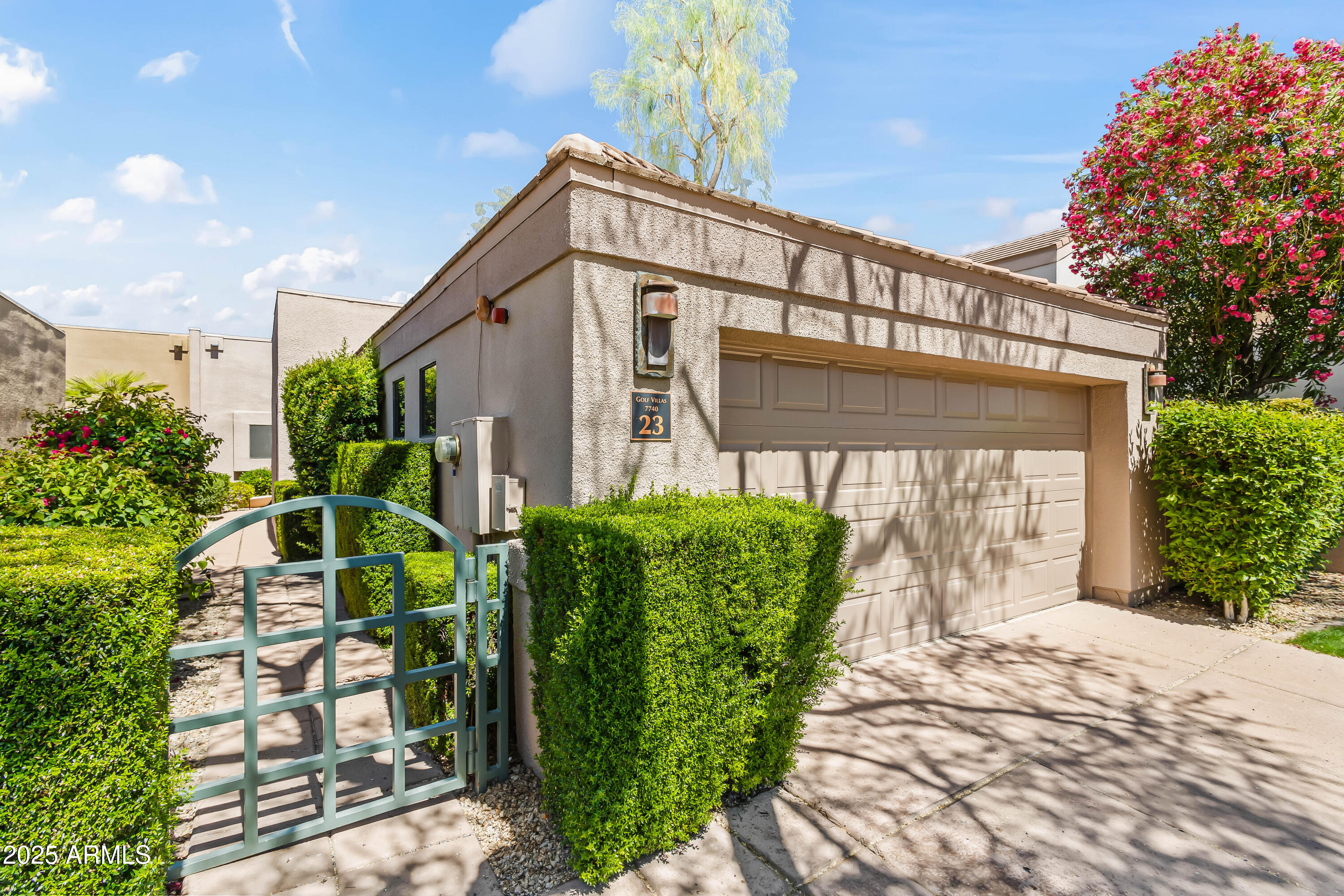 7740 East Gainey Ranch Road, Unit 23 Scottsdale, AZ 85258 - Photo 4 of 45 GATED FRONT COURTYARD_ WALKWAY