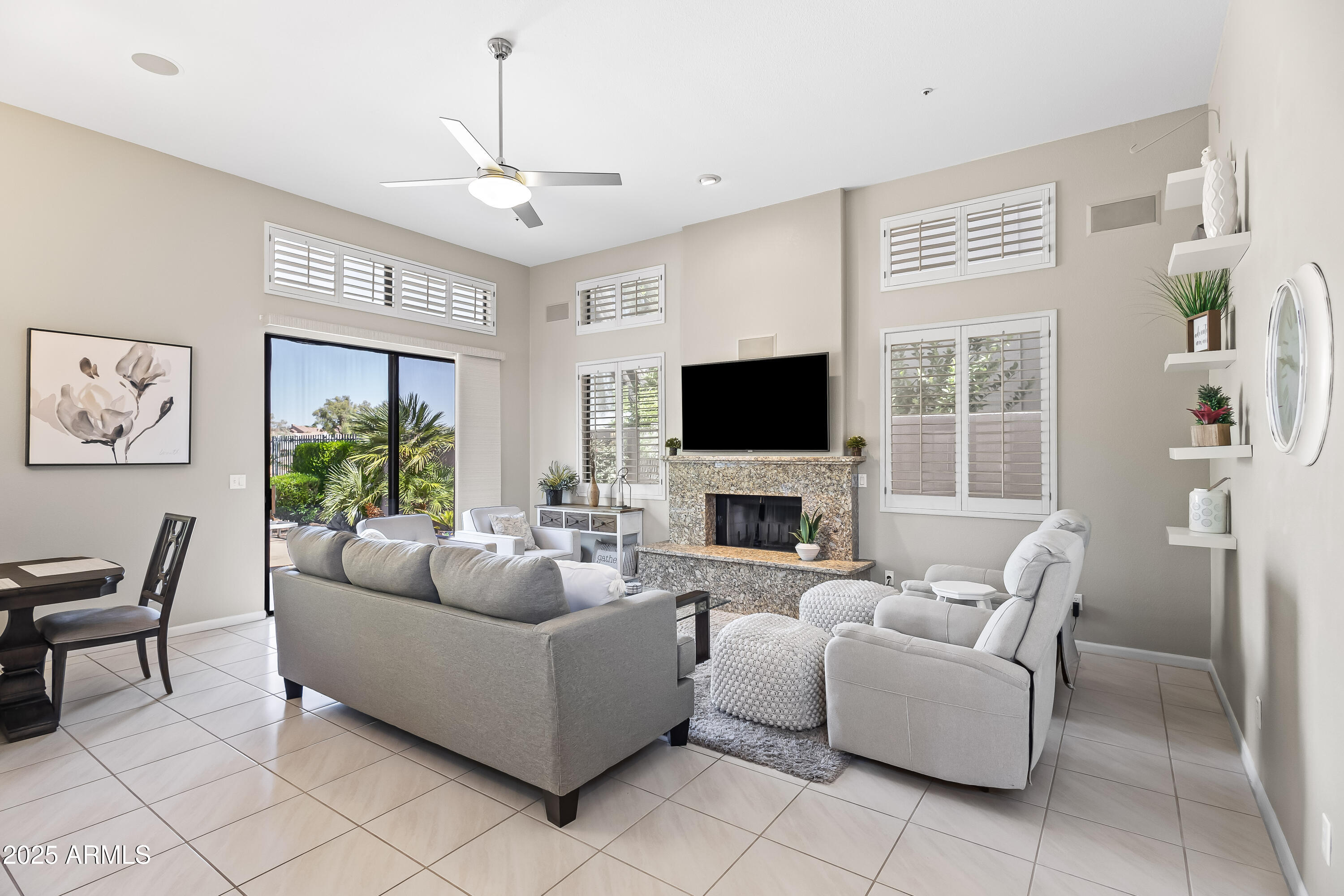 7740 East Gainey Ranch Road, Unit 23 Scottsdale, AZ 85258 - Photo 9 of 45 FAMILY RM + FIREPLACE