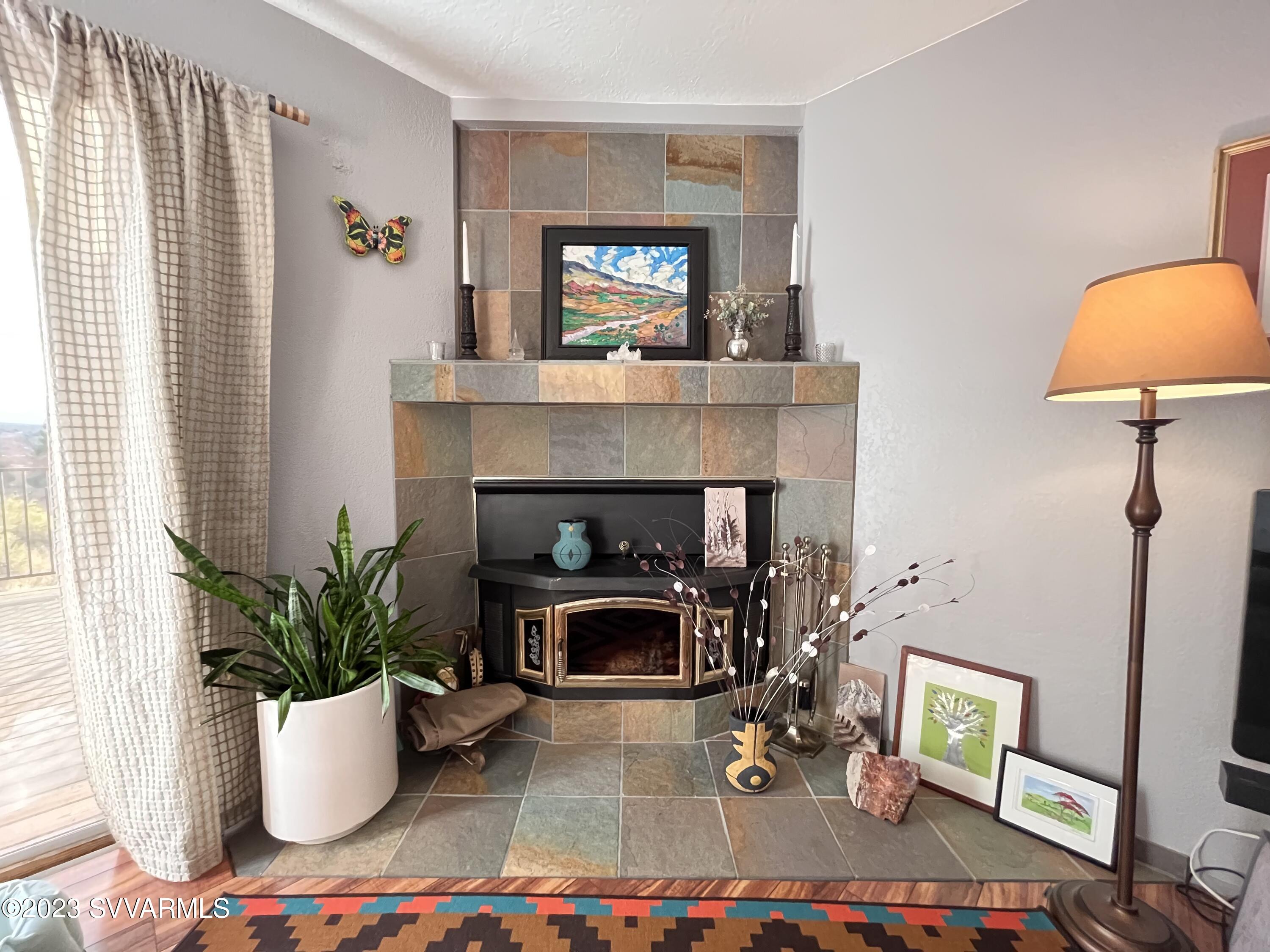4605 Pima Way Rimrock, AZ 86335 - Photo 11 of 77 a living room with furniture and a fireplace