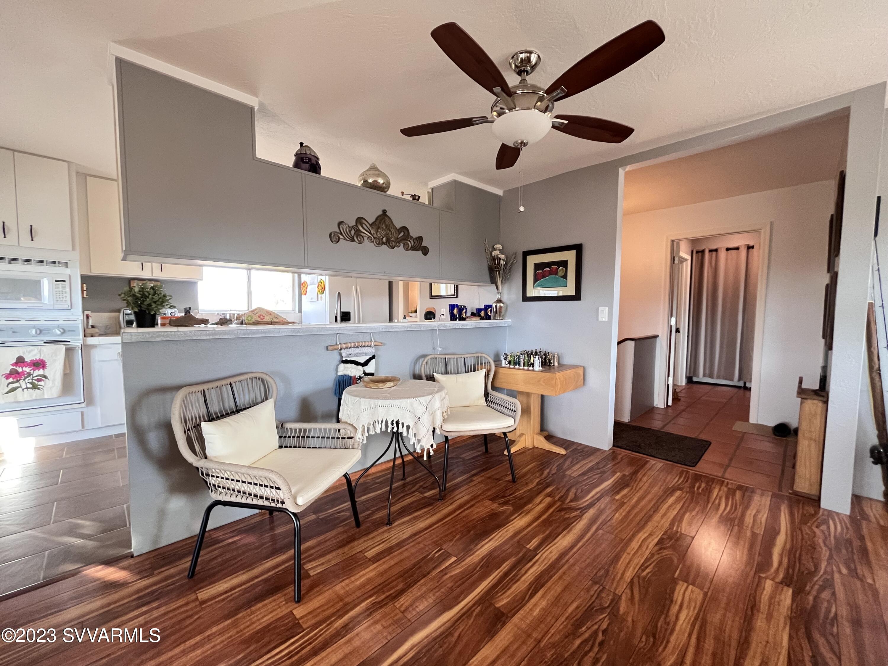 4605 Pima Way Rimrock, AZ 86335 - Photo 13 of 77 a living room with furniture and a wooden floor