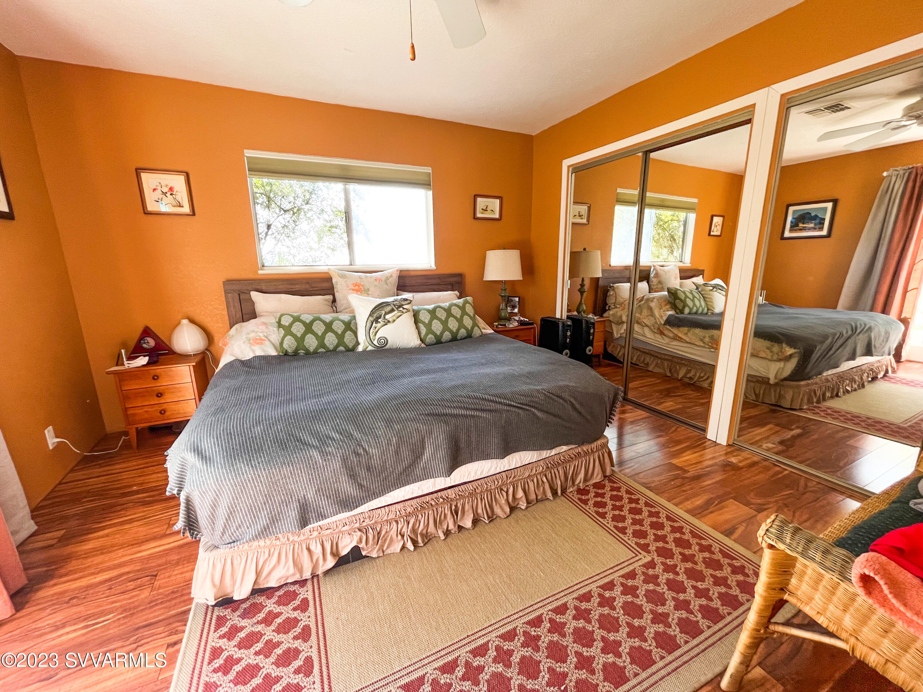 4605 Pima Way Rimrock, AZ 86335 - Photo 27 of 77 a bedroom with a bed and wooden floor