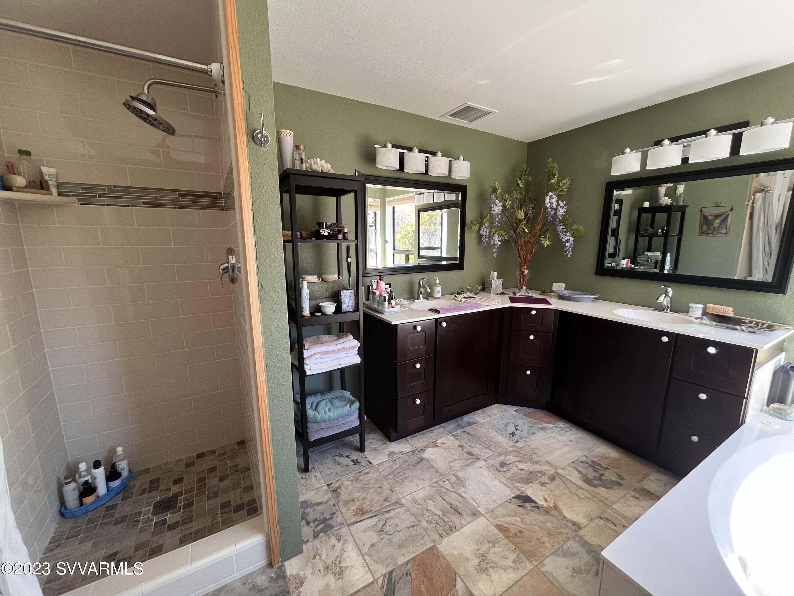 4605 Pima Way Rimrock, AZ 86335 - Photo 32 of 77 a bathroom with a sink vanity and a mirror