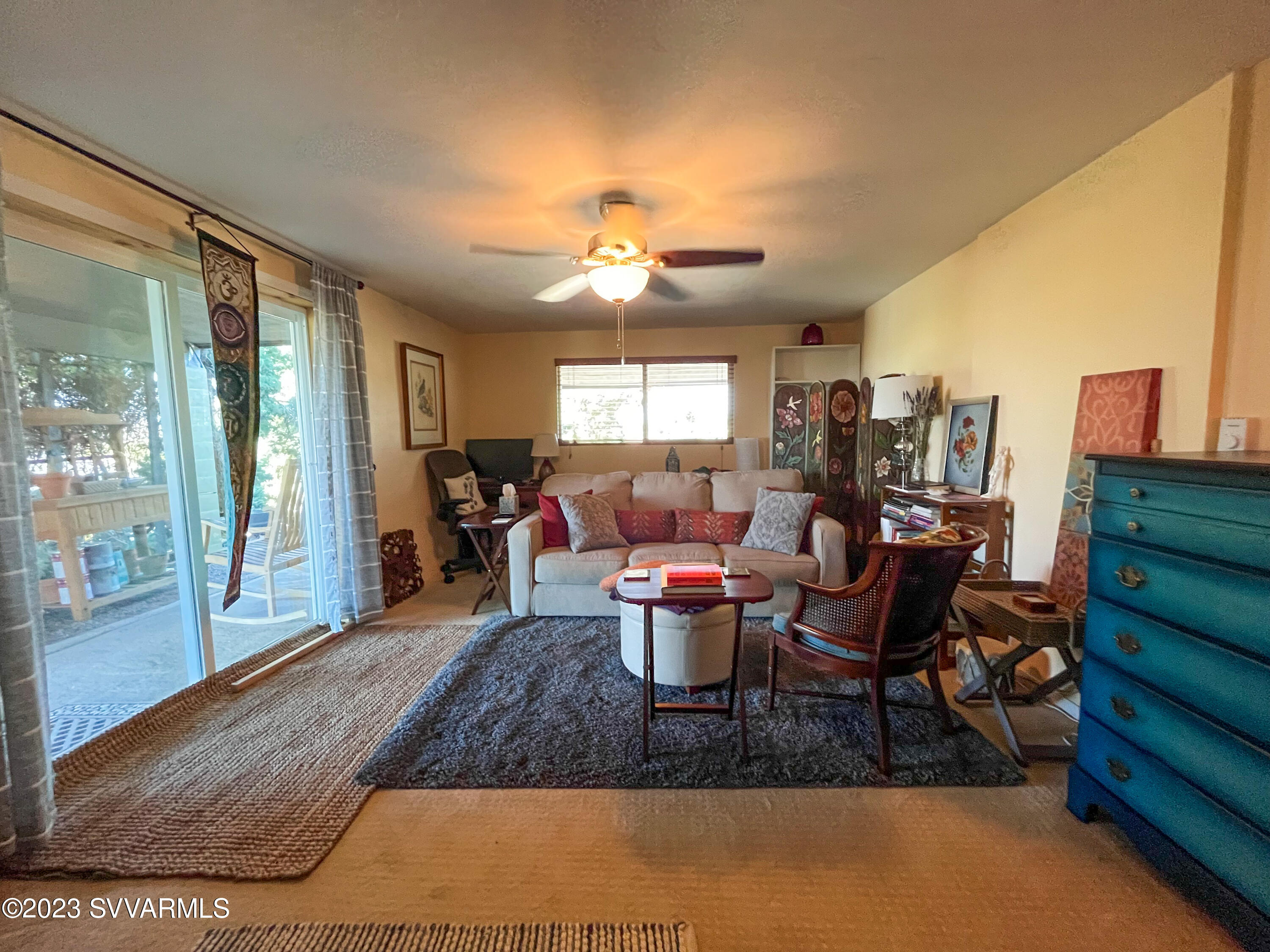 4605 Pima Way Rimrock, AZ 86335 - Photo 37 of 77 a dining room with furniture and a chandelier