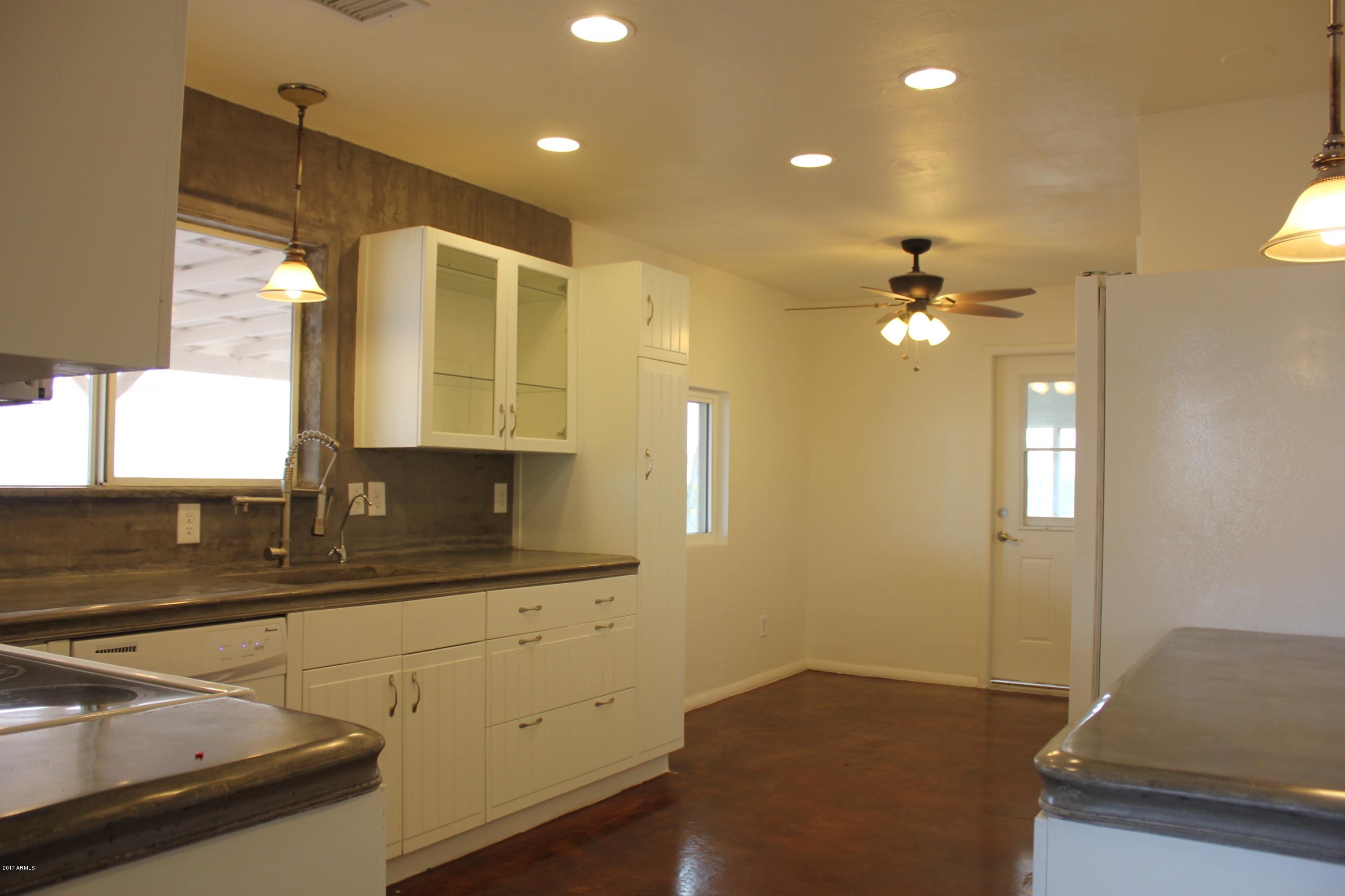 52727 West Roan Road Maricopa, AZ 85139 - Photo 7 of 27 Kitchen with new recessed lights