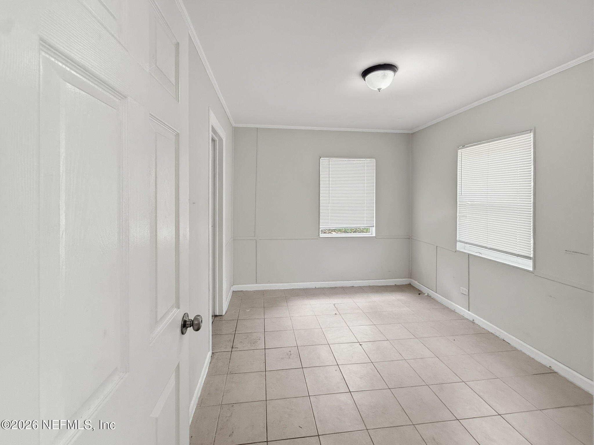 326 Cahoon Road South Jacksonville, FL 32220 - Photo 19 of 34 a view of an empty room and window
