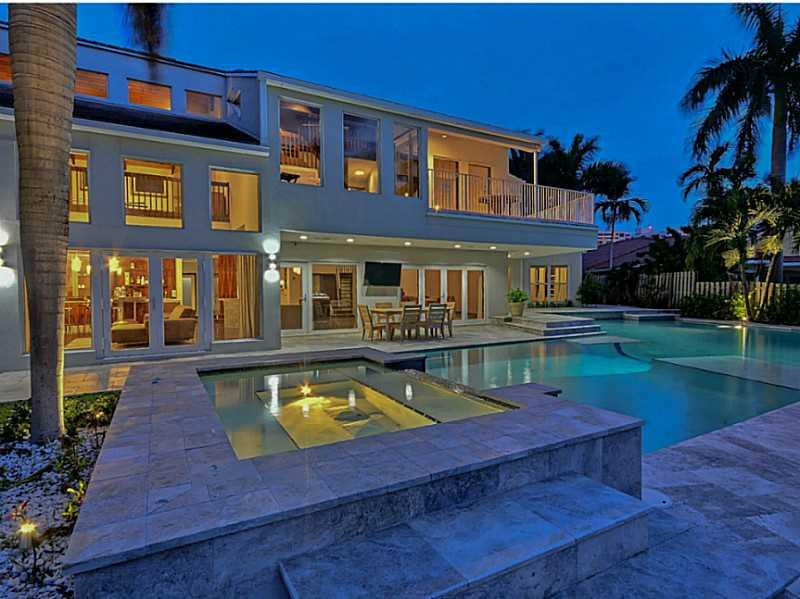 1 Seneca Road Sea Ranch Lakes, FL 33308 - Photo 28 of 35 a view of a house with swimming pool