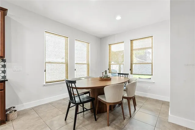 a view of a workspace with furniture and entryway