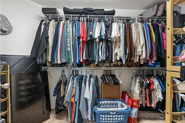 a view of a livingroom with furniture and window