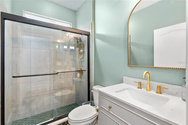 an aerial view of residential house with outdoor space and street view