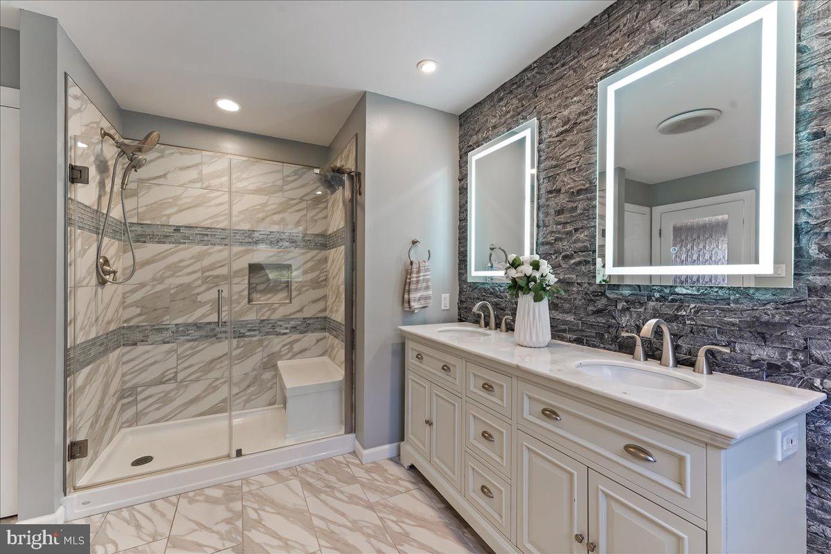 75 New Road Aston, PA 19014 - Photo 23 of 59 Dual sink vanity with mirror with dimmer lights