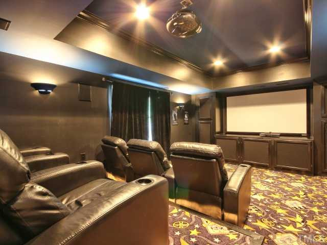 13133 Sargas Street Raleigh, NC 27614 - Photo 20 of 25 Awesome media room in the basement.