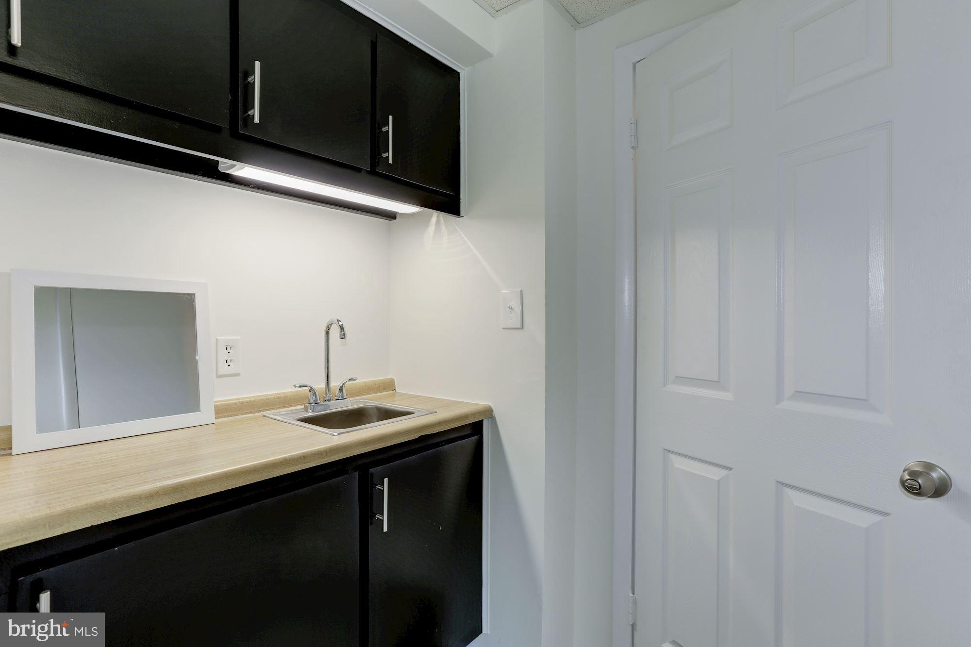 9418 Northgate Road Laurel, MD 20723 - Photo 30 of 49 Wet Bar in Lower Level Family Room