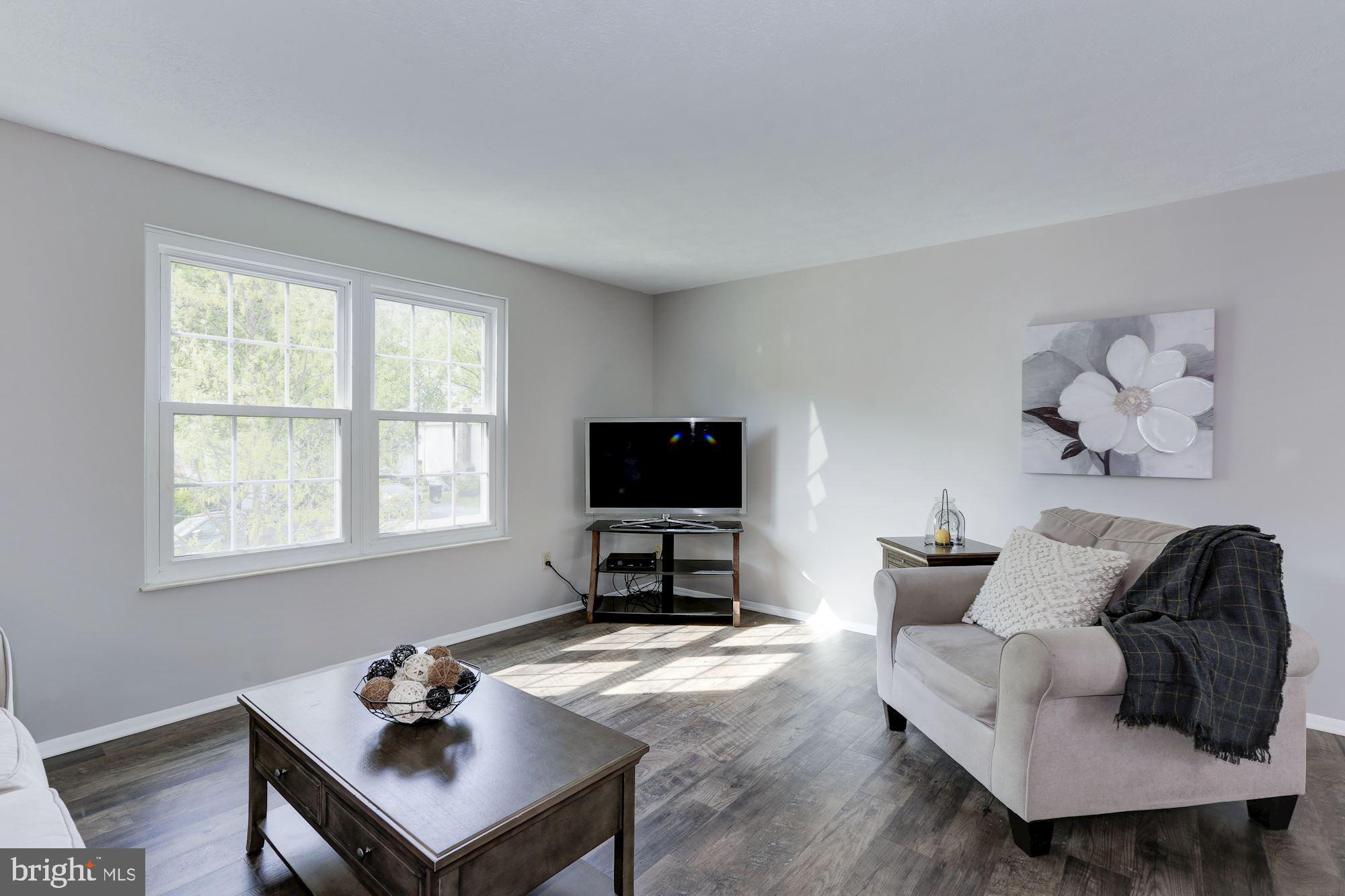 Engineered hardwoods throughout the main level