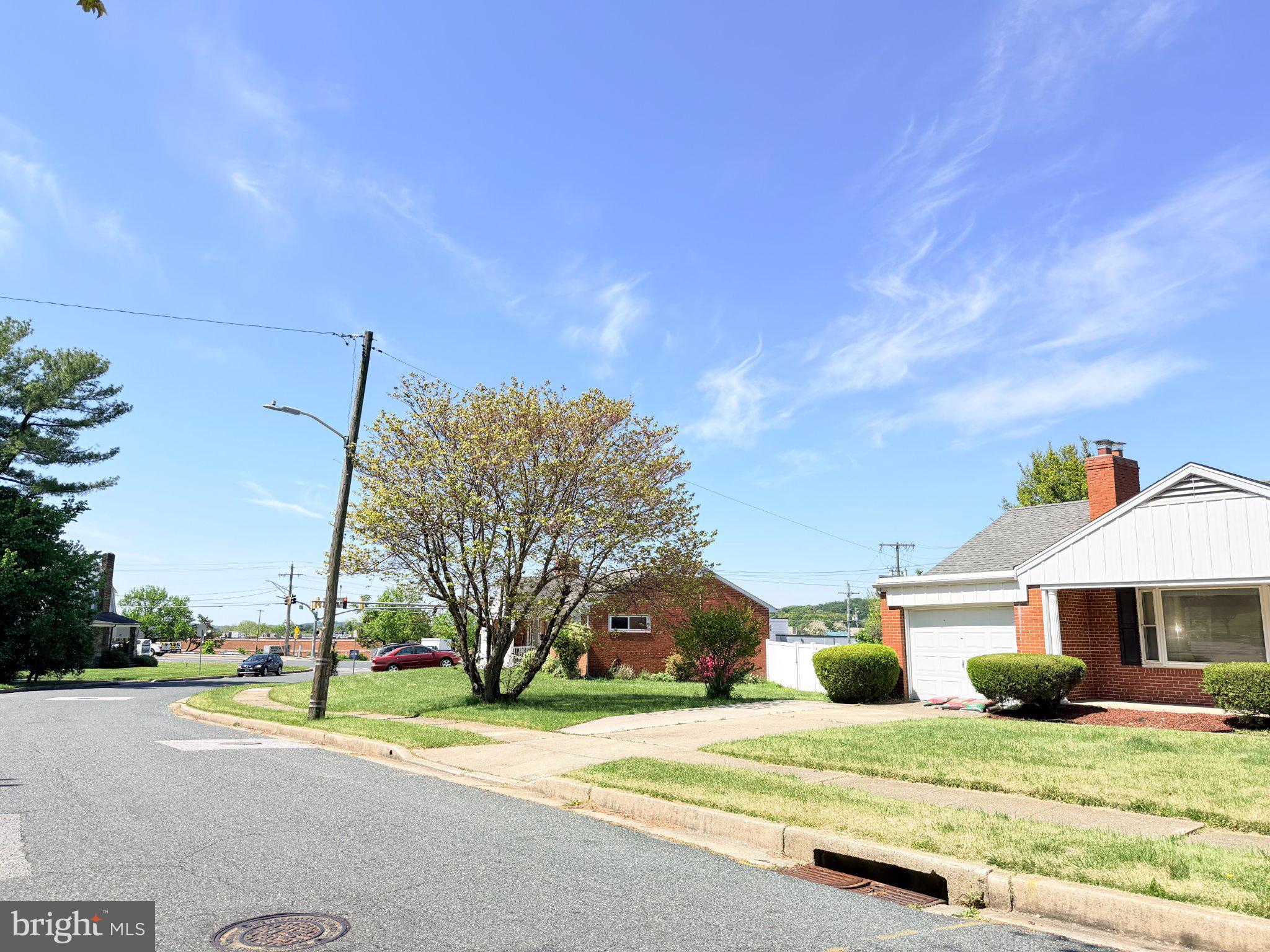 6 East Aylesbury Road Lutherville-Timonium, MD 21093 - Photo 19 of 19 Charming neighborhood under blue skies.