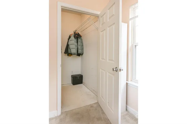 a bathroom with a shower and a shower