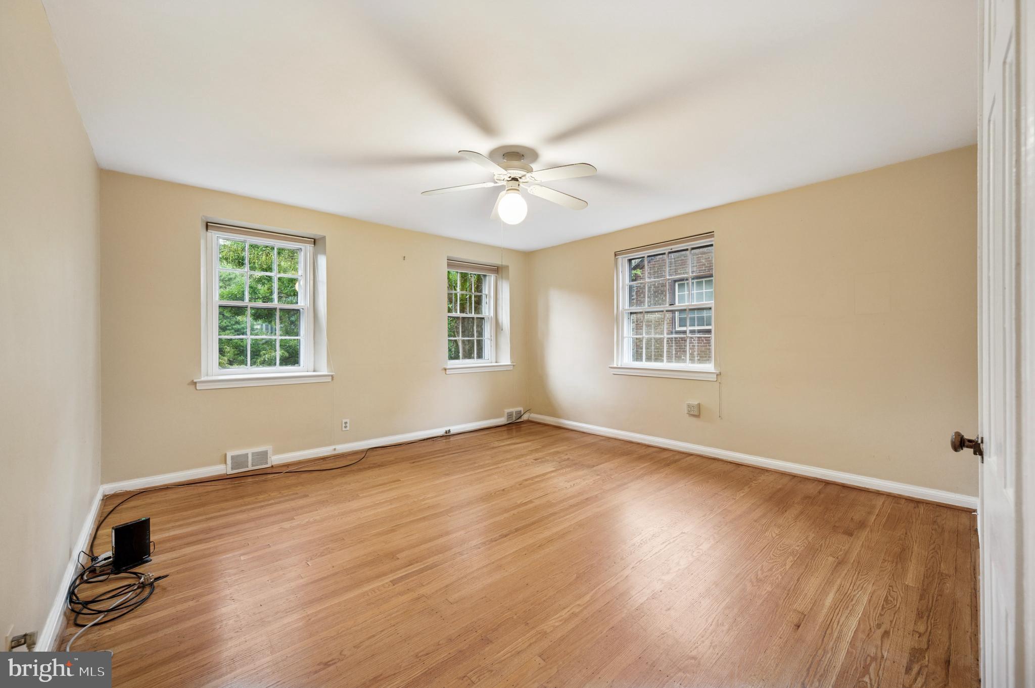 524 Lafayette Road Merion Station, PA 19066 - Photo 16 of 25 wooden floor in an empty room with a window