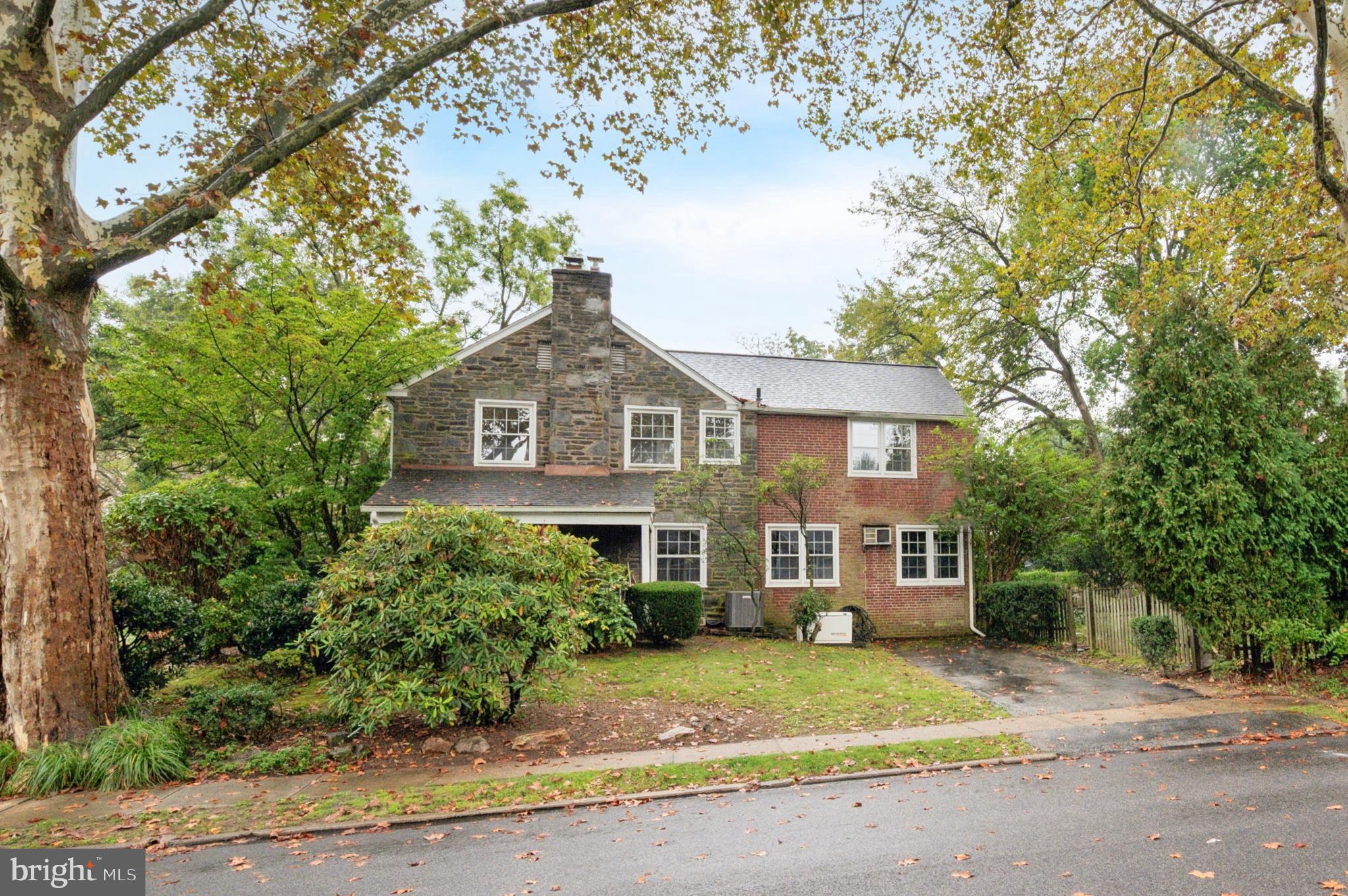 524 Lafayette Road Merion Station, PA 19066 - Photo 25 of 25 a front view of a house with a garden