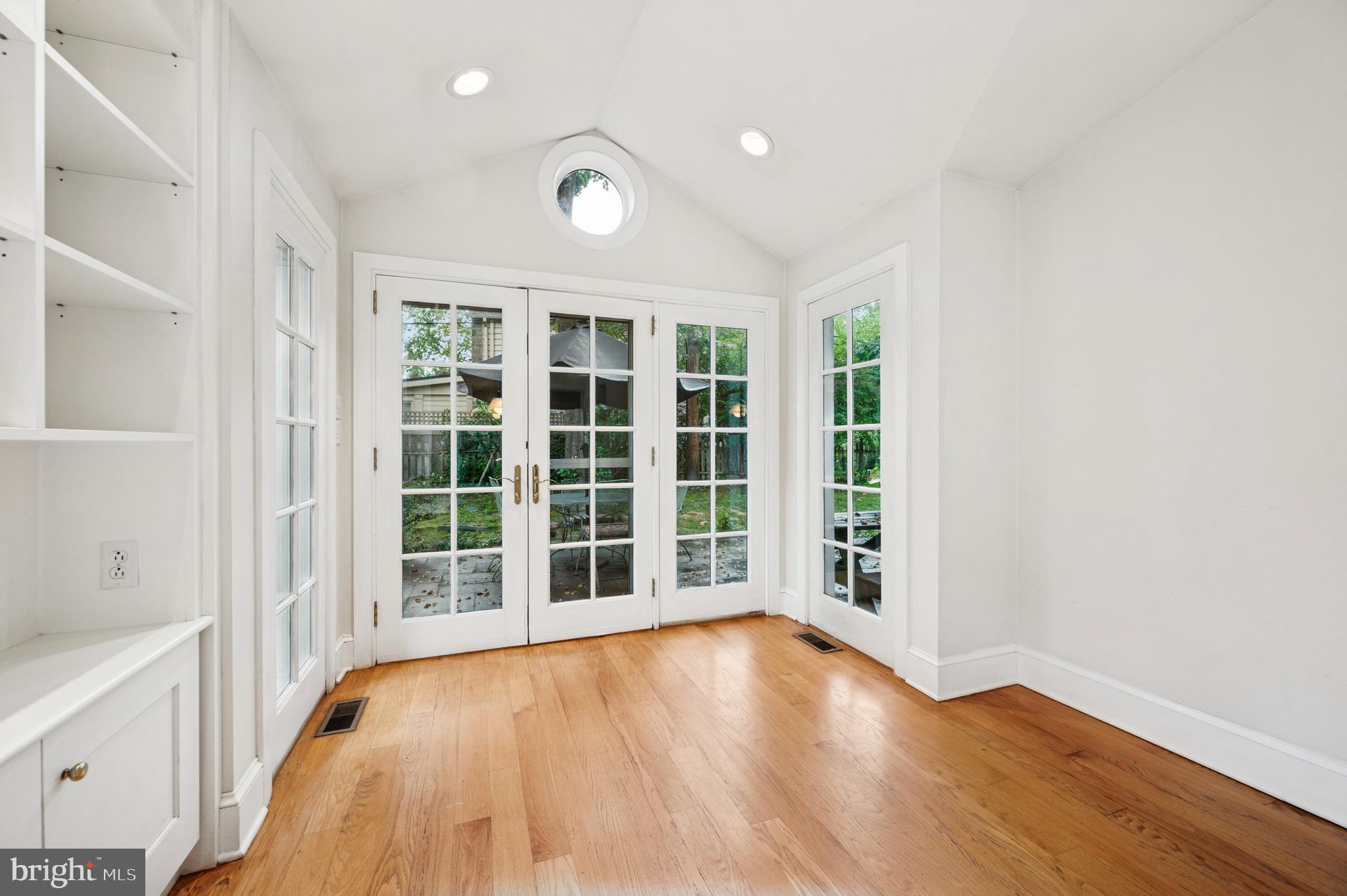 524 Lafayette Road Merion Station, PA 19066 - Photo 9 of 25 an empty room with wooden floor and windows
