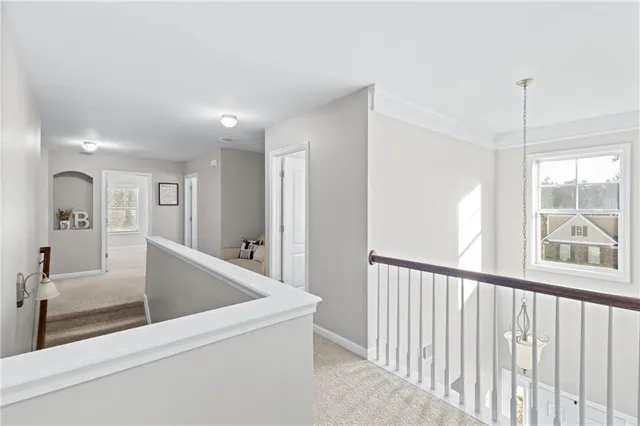 a view of entryway with kitchen