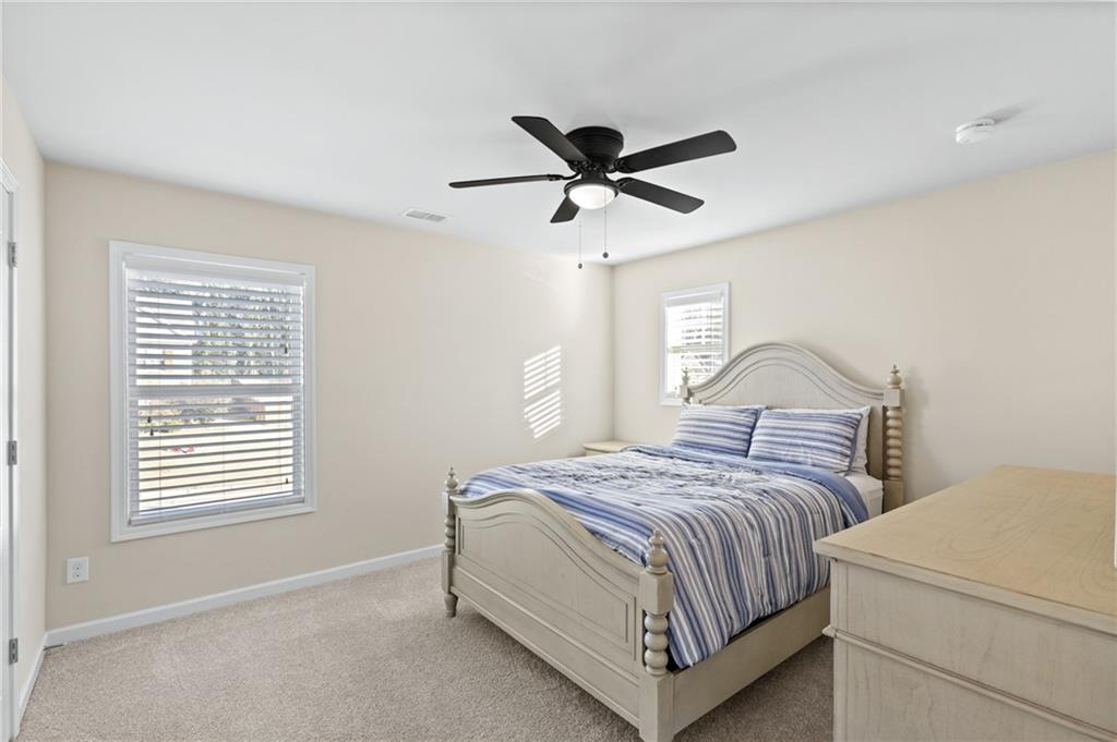 285 Paces Drive Lithia Springs, GA 30122 - Photo 29 of 45 a bedroom with a bed and window
