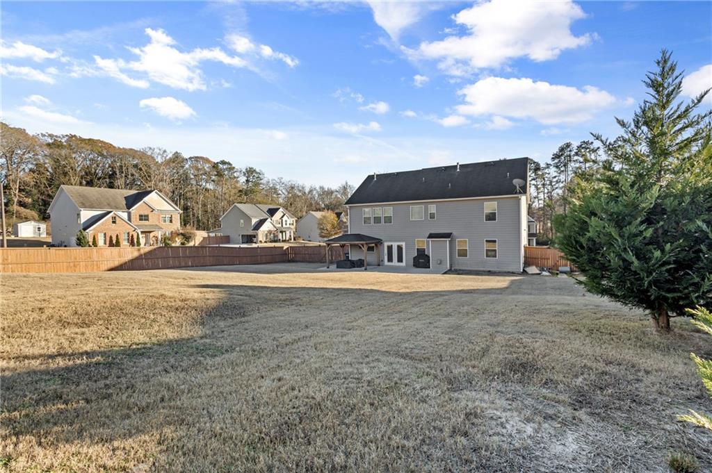 285 Paces Drive Lithia Springs, GA 30122 - Photo 35 of 45 a view of a house with a yard