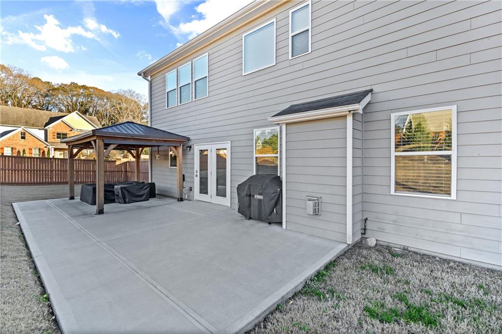 285 Paces Drive Lithia Springs, GA 30122 - Photo 37 of 45 a view of a house with backyard and sitting area