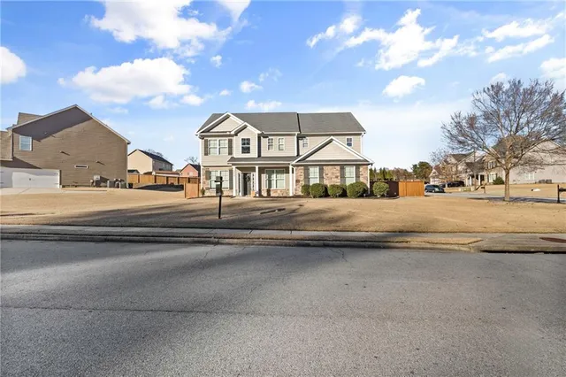 a view of a street with a house