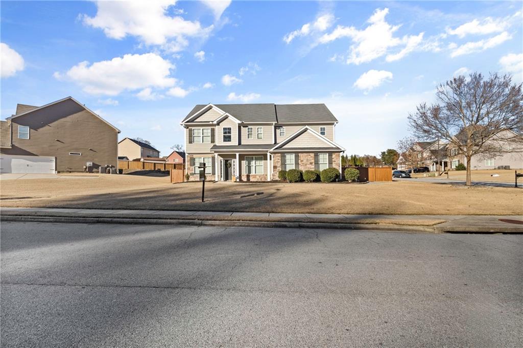 285 Paces Drive Lithia Springs, GA 30122 - Photo 44 of 45 a view of houses with a street
