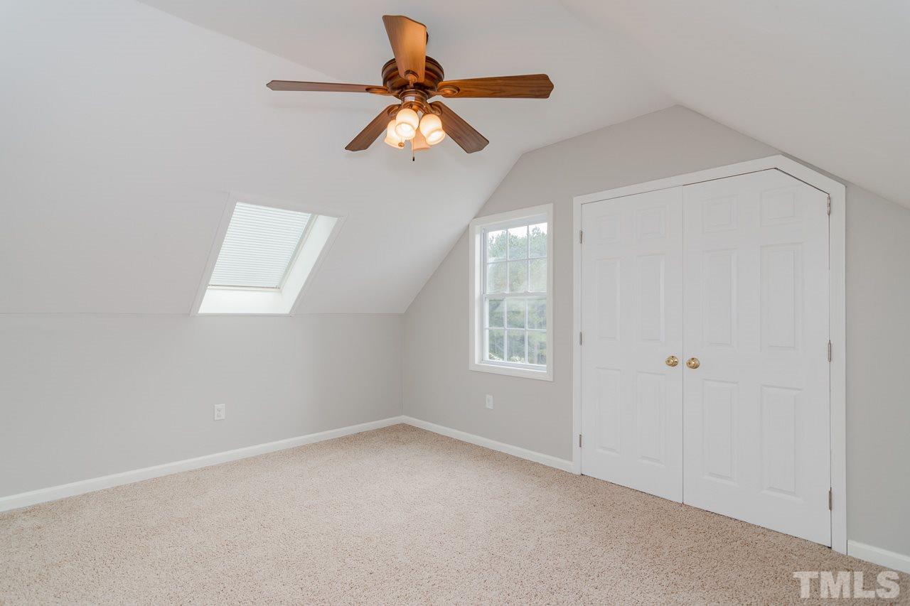 1820 Emerson Cook Road Pittsboro, NC 27312 - Photo 20 of 30 The perfect place for movie night or area for play time. This bonus room is spacious and yields the ideal space for relaxation or fun.
