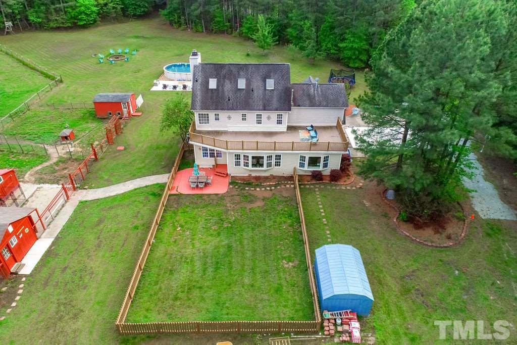 1820 Emerson Cook Road Pittsboro, NC 27312 - Photo 22 of 30 Private deck provides a space for relaxing, enjoying outdoor meals, or entertaining family and friends.