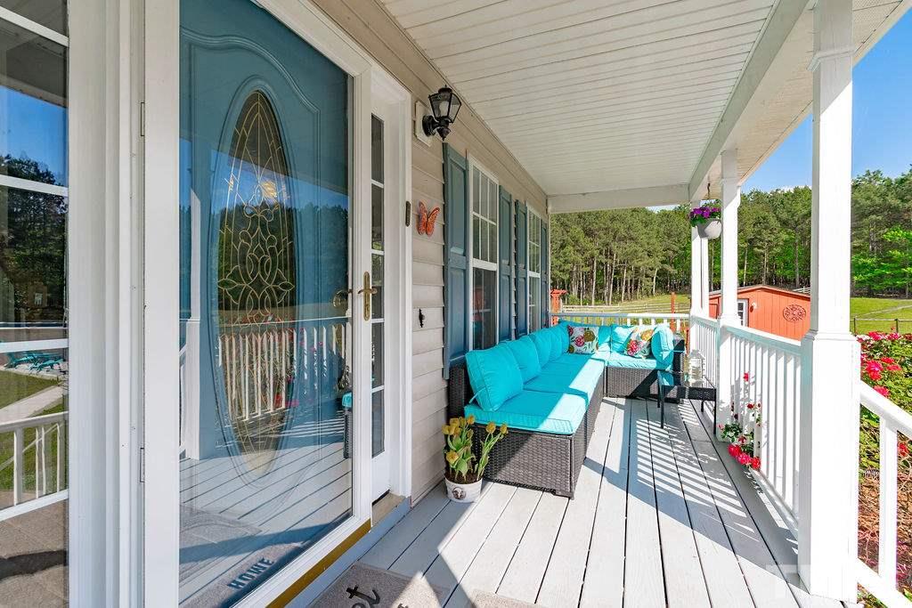 Stay cool in the shade of your covered front porch on hot NC summer days.