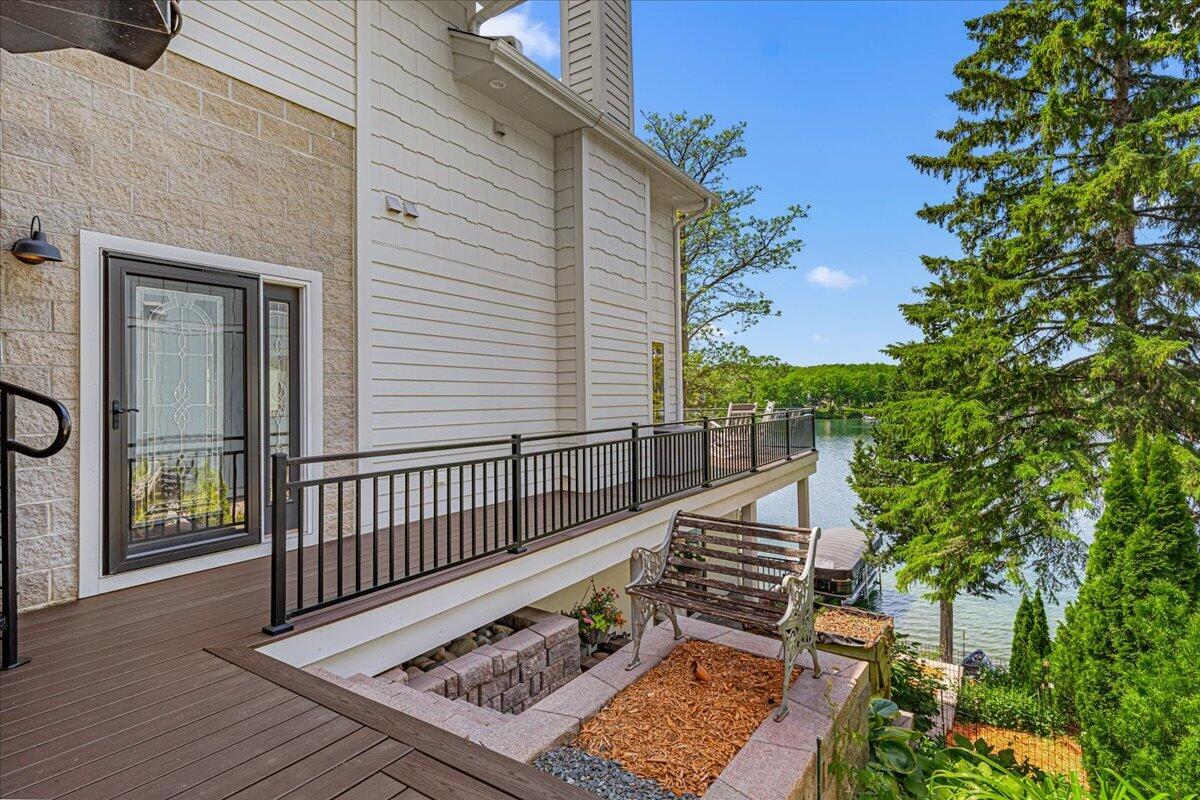 4763 Fontana Beach Road, Unit 4762 Polk, WI 53086 - Photo 12 of 100 Front Door - Wrap Around Deck