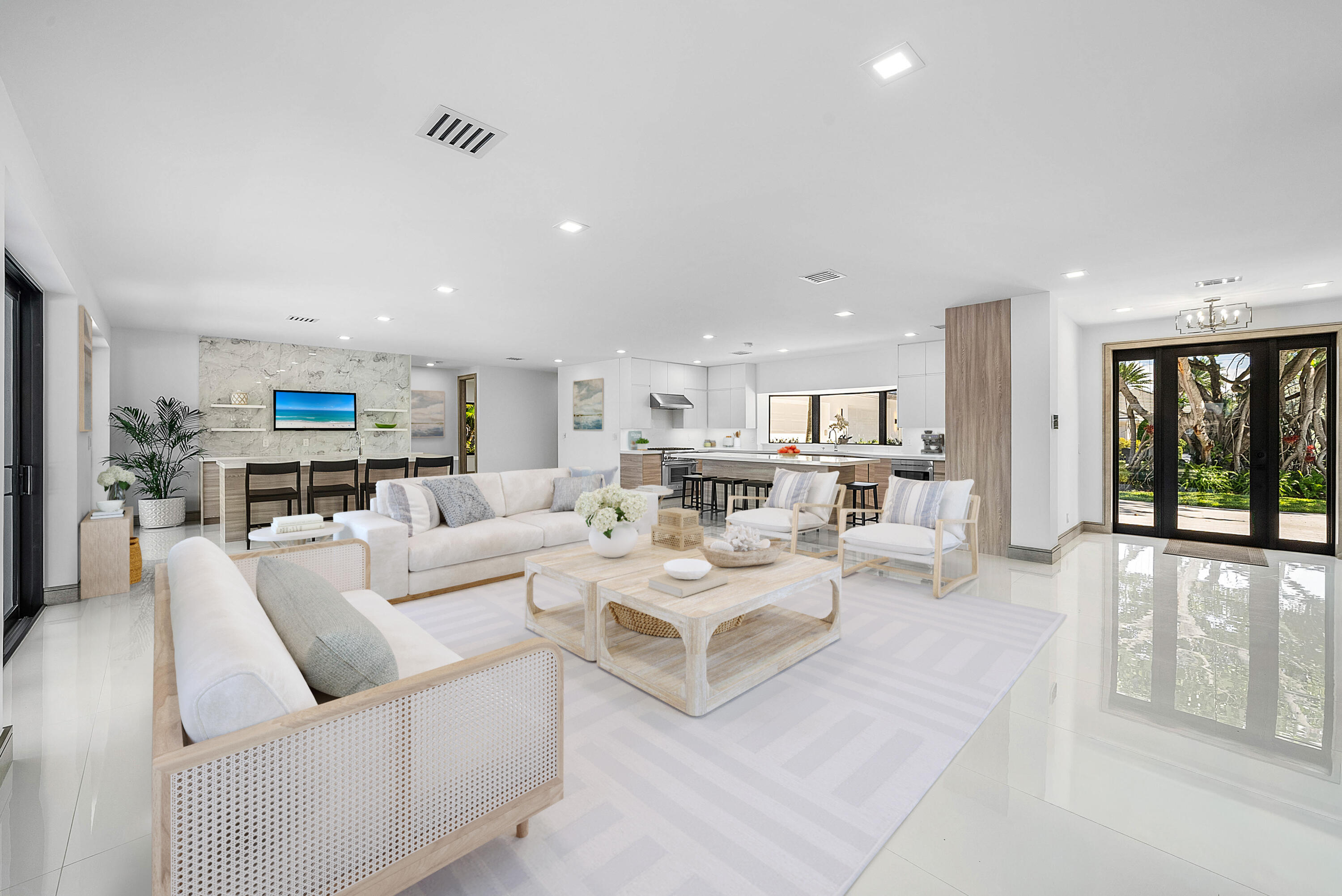 40 Spoonbill Road Manalapan, FL 33462 - Photo 15 of 67 a living room with furniture and a large window