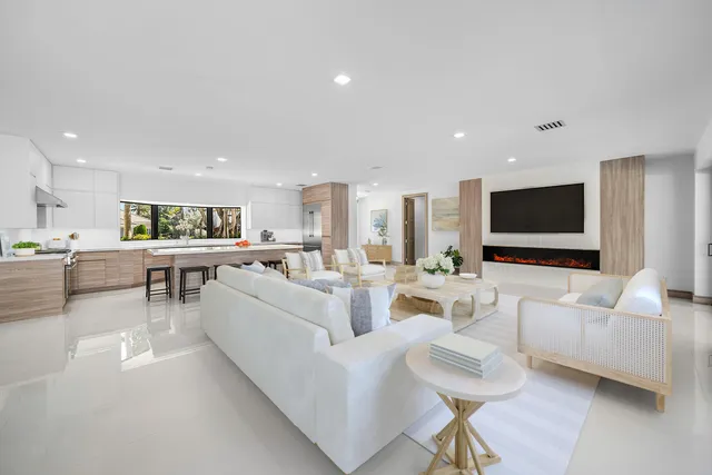 a view of a hallway with paintings on the wall