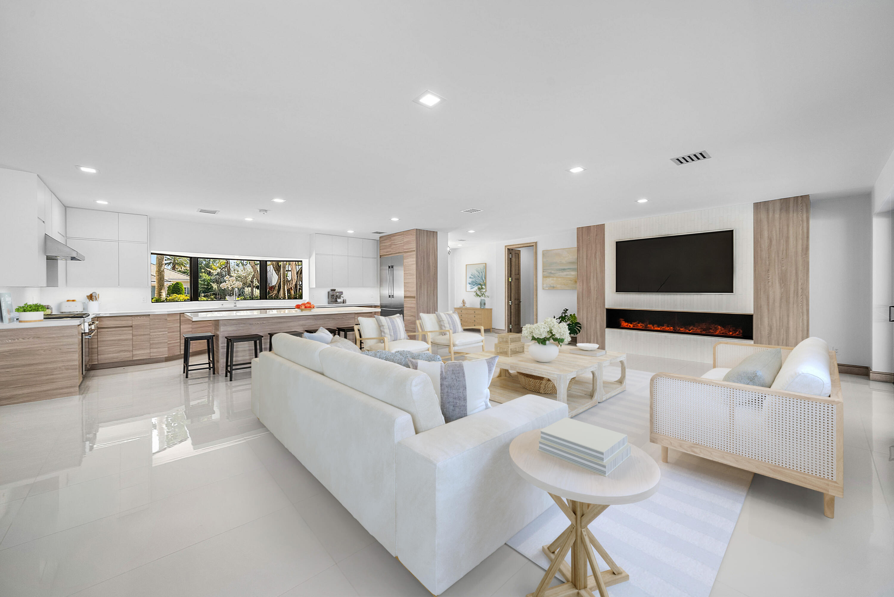 40 Spoonbill Road Manalapan, FL 33462 - Photo 17 of 67 a living room with furniture and a flat screen tv