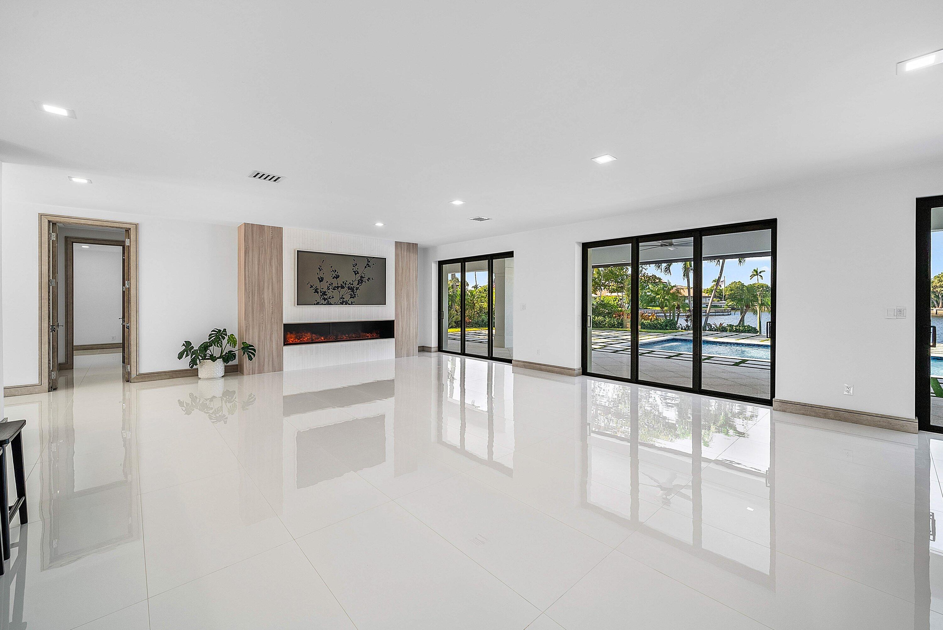 40 Spoonbill Road Manalapan, FL 33462 - Photo 20 of 67 an empty room with windows and view of living room