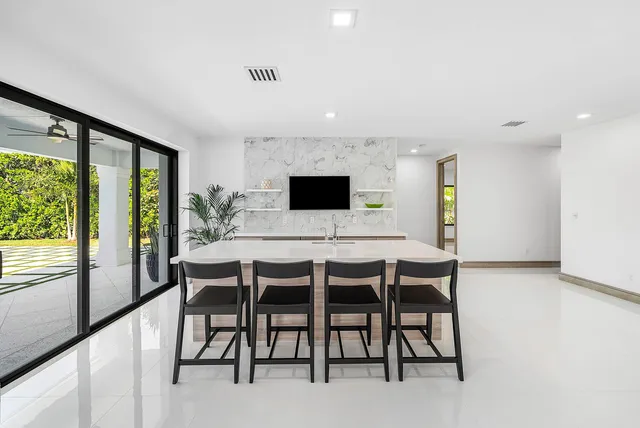 a bathroom with a sink toilet a shower and a mirror