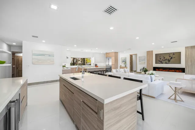 a bathroom with a toilet sink and shower