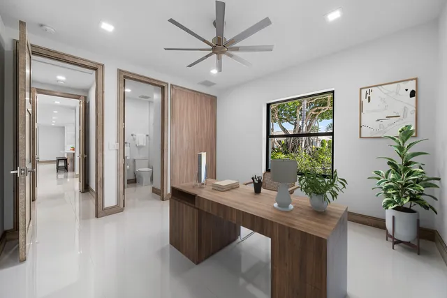 a view of a patio with couches chair and potted plants