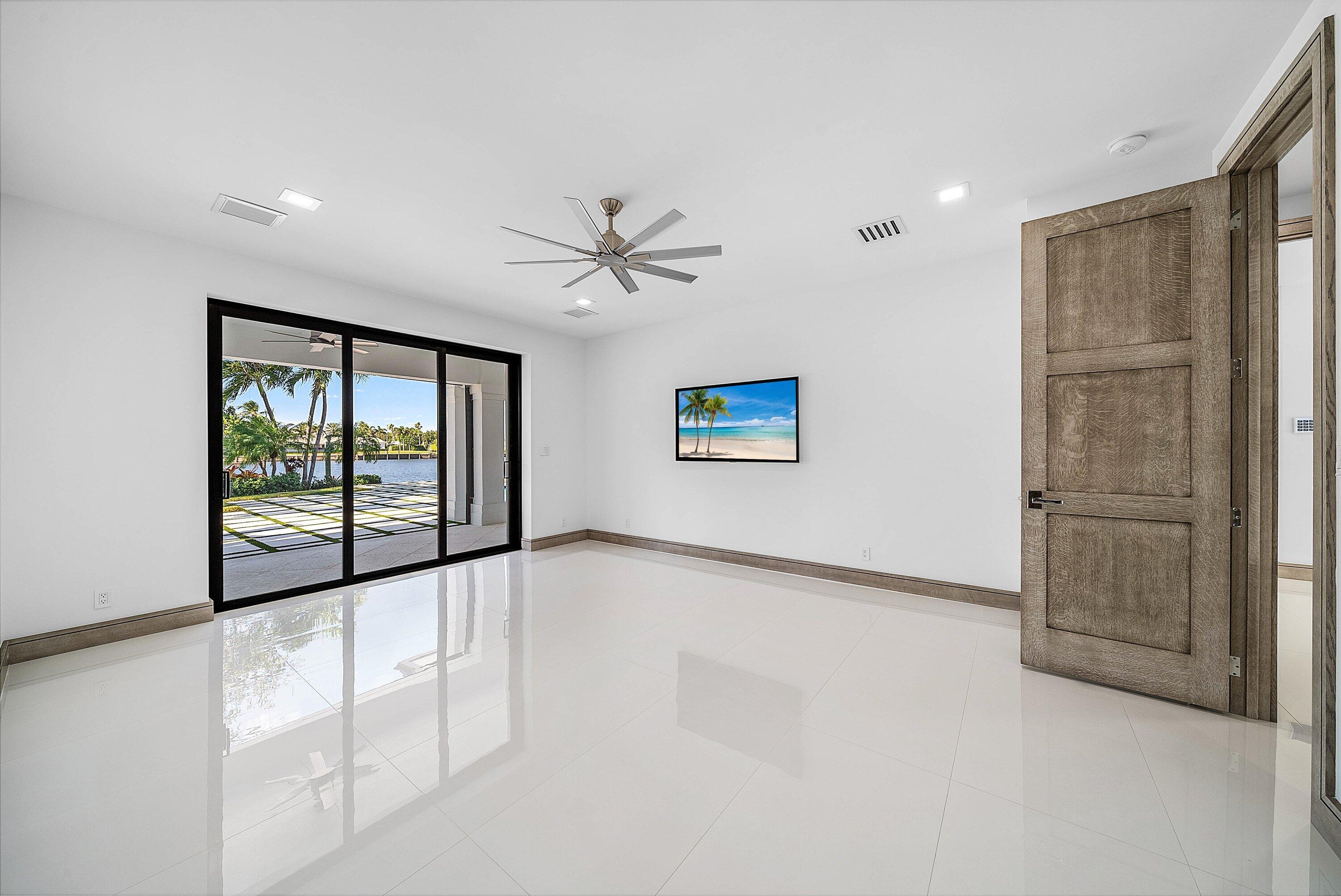 40 Spoonbill Road Manalapan, FL 33462 - Photo 46 of 67 a view of an empty room with a window