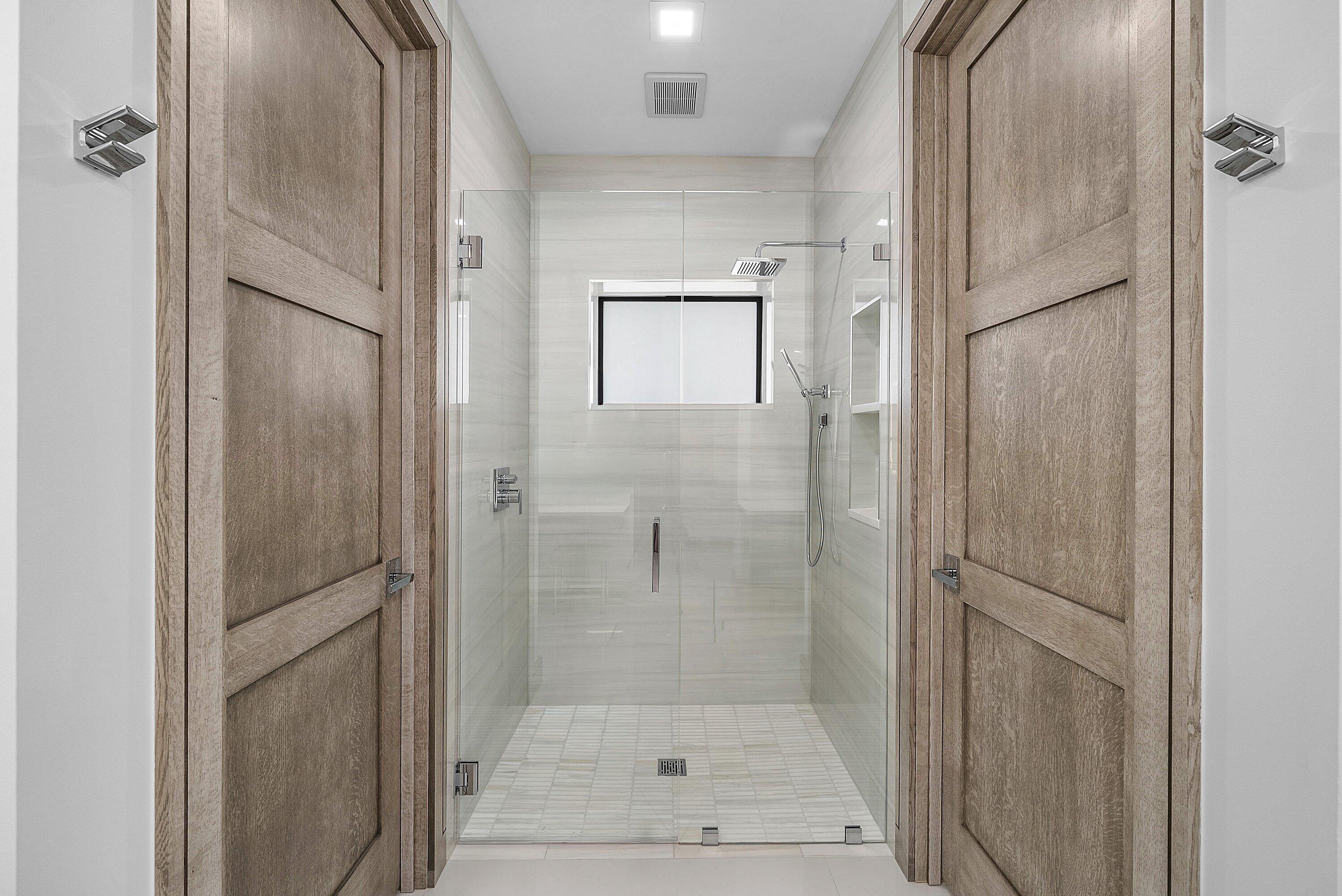 40 Spoonbill Road Manalapan, FL 33462 - Photo 51 of 67 a bathroom with a shower