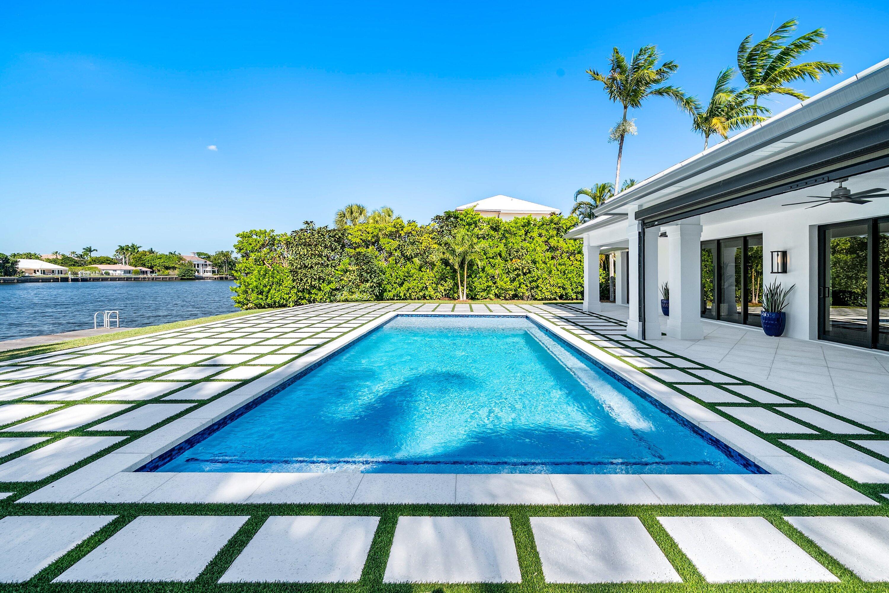 40 Spoonbill Road Manalapan, FL 33462 - Photo 6 of 67 a view of an outdoor space and swimming pool
