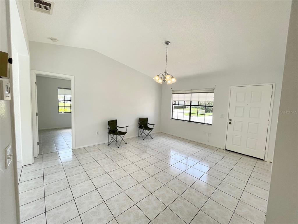 13100 South McCall Road, Unit 125 Port Charlotte, FL 33981 - Photo 8 of 19 a view of an empty room and window