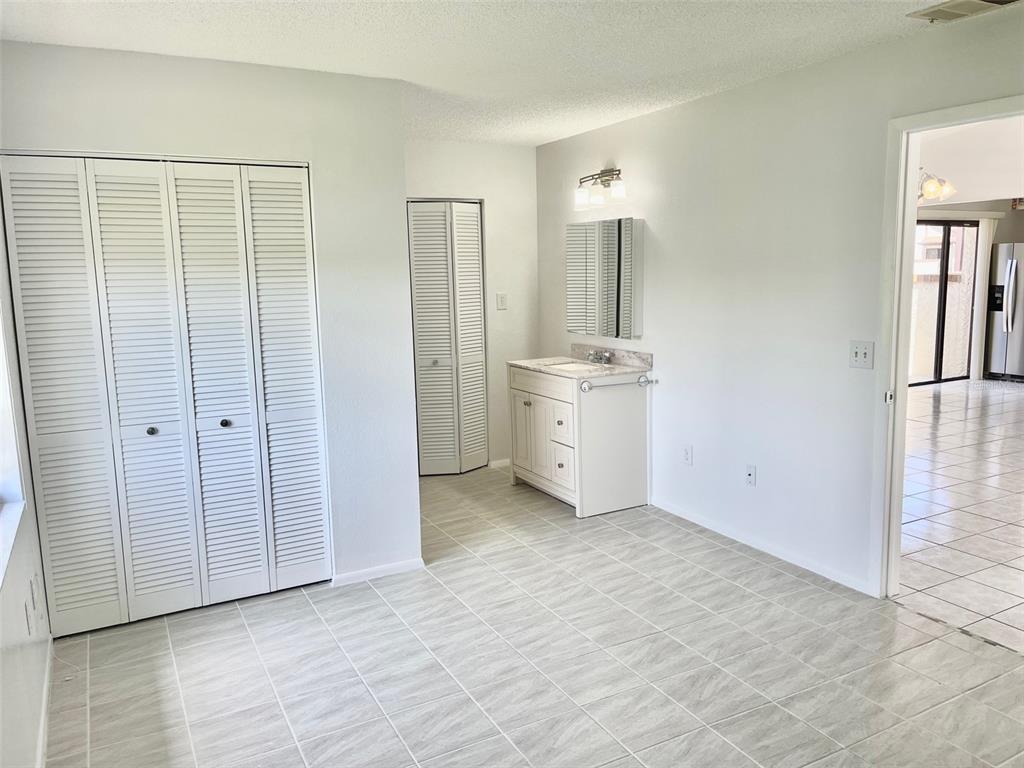 13100 South McCall Road, Unit 125 Port Charlotte, FL 33981 - Photo 10 of 19 a view of an empty room with closet area