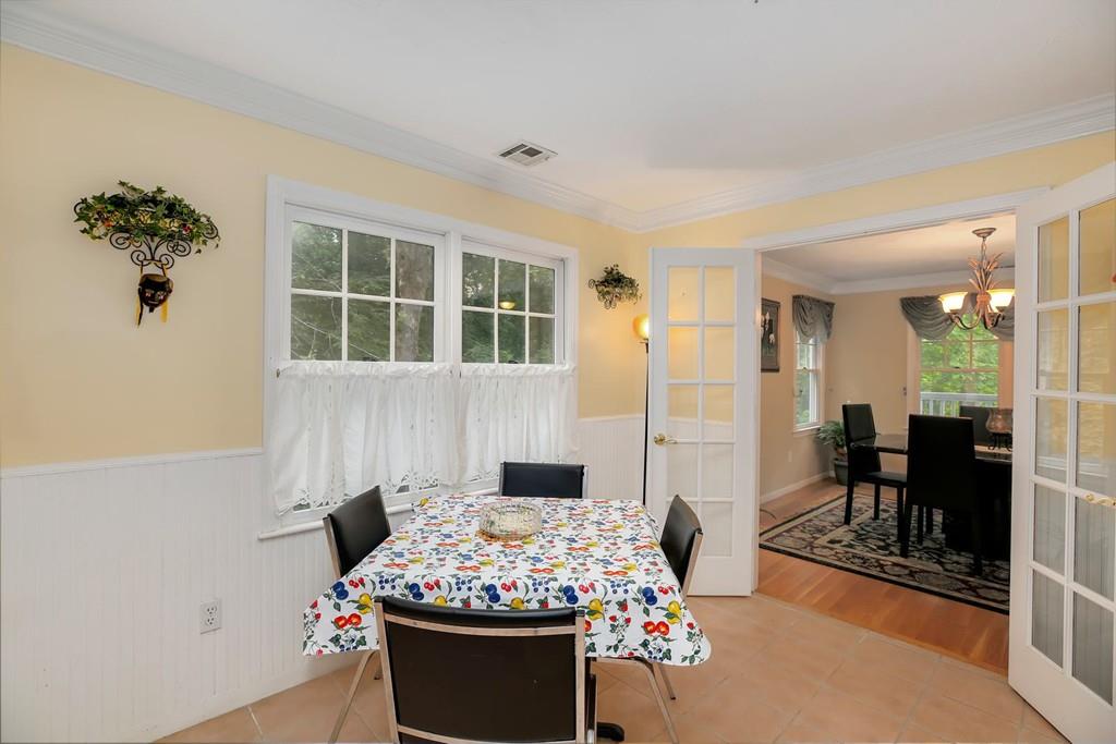 7 Cedar Brook Road Wellesley, MA 02482 - Photo 17 of 36 a living room with furniture and a potted plant